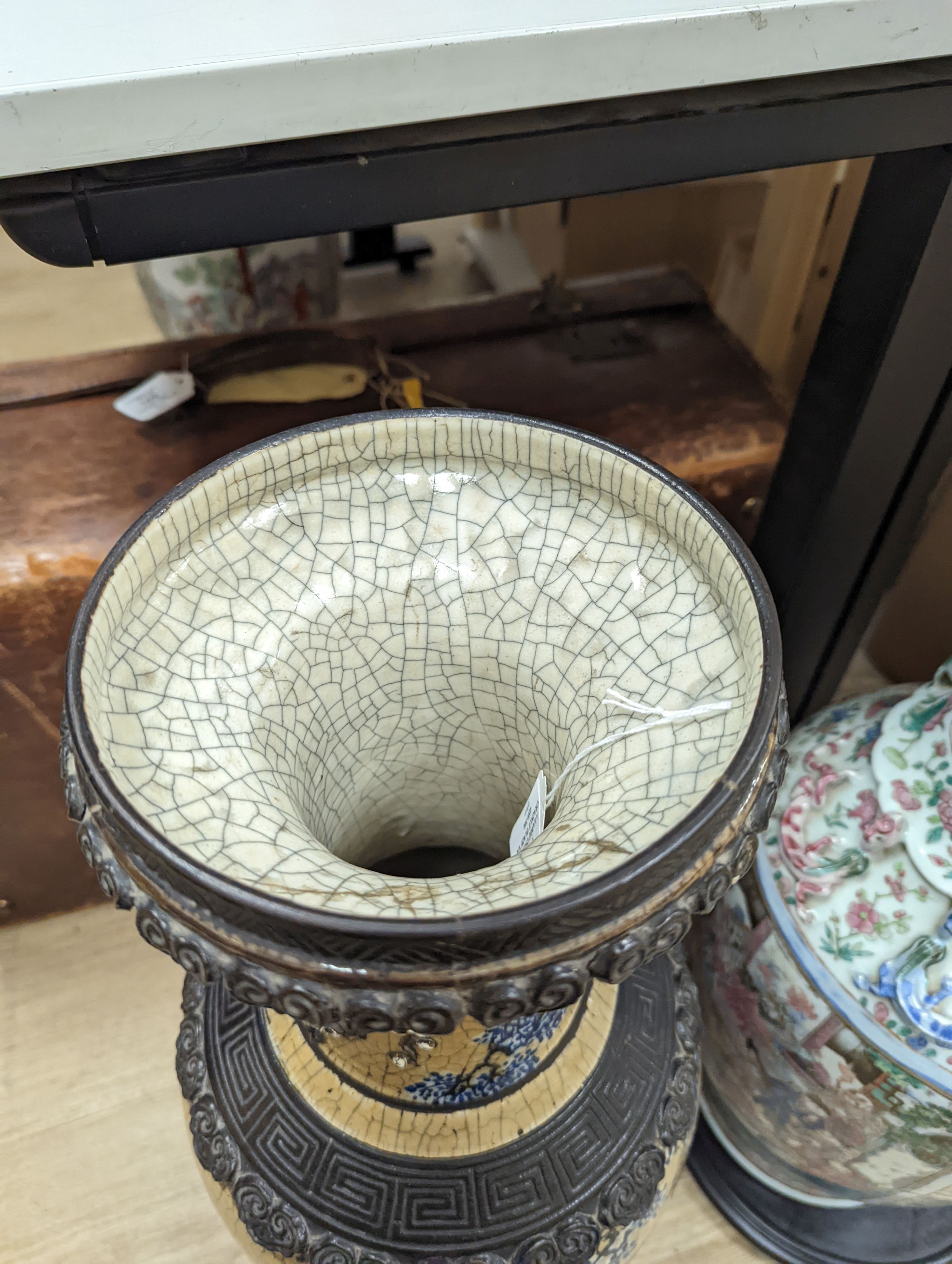 A large Chinese crackle glaze vase, late 19th/early 20th century and a large Chinese famille rose vase, late 19th century, tallest 60 cm.